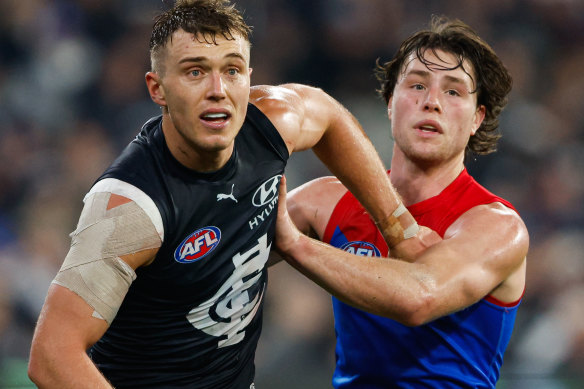Demons make a late surge, cut Carlton’s lead to 13 points
