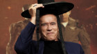 Arnold Schwarzenegger wears a South Korean traditional hat while promoting Terminator: Dark Fate in Seoul on October 21.