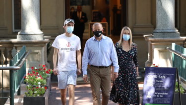 Labor leader Anthony Albanese, with girlfriend Jodie Haydon and son Nathan, leaves Royal Prince Alfred Hospital after he was in a car crash. 