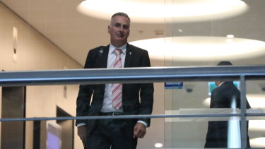 NSW MP John Sidoti leaving the ICAC on Tuesday. In the witness box Mr Sidoti blamed a poor choice of words in a third email to councillors accusing council staff of being misleading “to sell the business community of Five Dock a pup”.