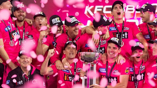 The Sydney Sixers celebrate winning last summer's BBL.