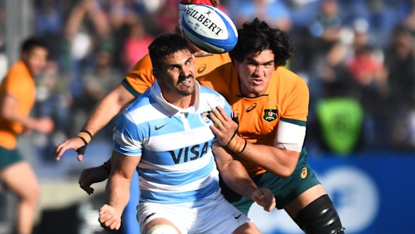 Pablo Matera, left, and Darcy Swain, vie for possession.