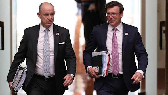 Government Services Minister Stuart Robert and Minister for Population, Cities and Urban Infrastructure Alan Tudge, who has also held the human services portfolio.