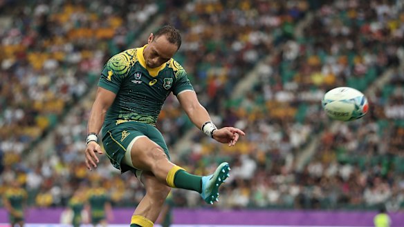 Christian Lealiifano kicks during Australia's 45-10 win over Uruguay. 