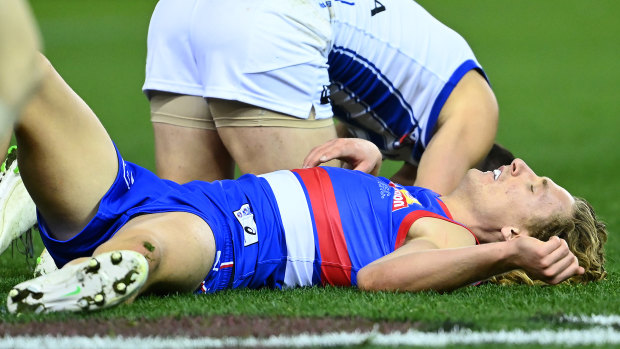 Aaron Naughton was concussed after landing heavily in a marking contest against North Melbourne in July.