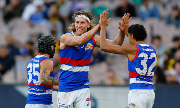 Aaron Naughton’s under-18s state coach Peter Sumich thinks he will serve the Bulldogs better as a key defender.