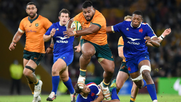 Replacement prop Taniela Tupou makes a ferocious charge late in the match.