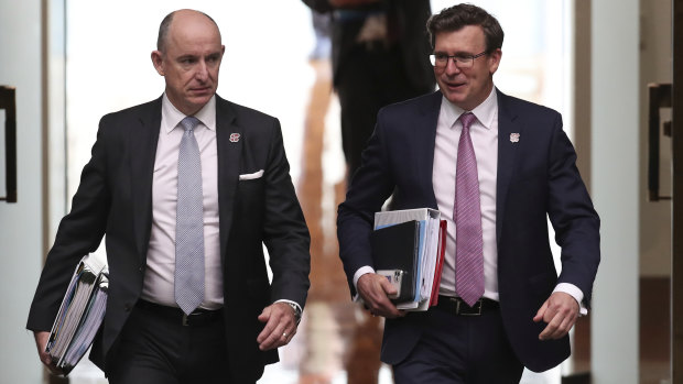 Government Services Minister Stuart Robert and Minister for Population, Cities and Urban Infrastructure Alan Tudge, who has also held the human services portfolio.