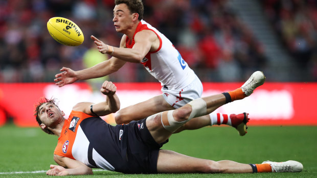 Swan Will Hayward contests the ball.