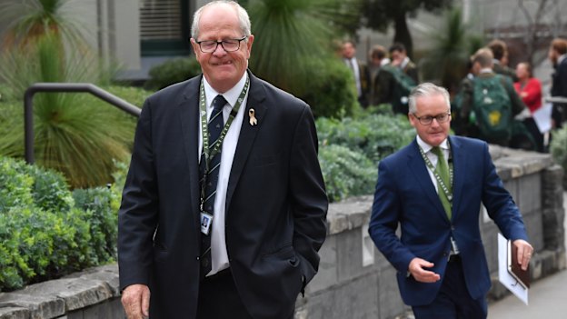 Rohan Brown, at left, and principal Michael Davies on the day Brown returned to the school. 