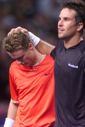 Lleyton Hewitt being congratulated by Pat Rafter after his win to make him No 1.