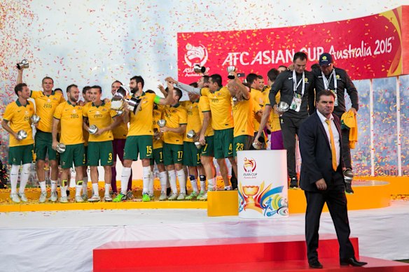 Ange Postecoglou walks off stage a winner after the 2015 Asian Cup final.