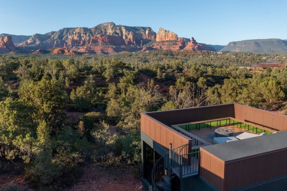 Every villa has a private rooftop with a daybed and firepit.