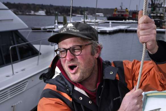 Bennett Konesni sings a sea shanty while raising a sail on his ketch in Belfast, Maine. Konesni started singing sea shanties aboard a schooner in Penobscot Bay and has since traveled the world studying work songs. The app TikTok helped sea shanties surge into the mainstream. 