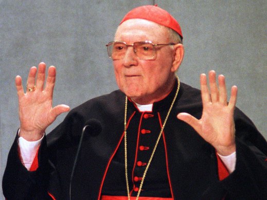 Cardinal Edward Cassidy, the Australian head of the Vatican Commission for Religious Relations with Jews, gestures during a news conference at the Vatican, 2012. 