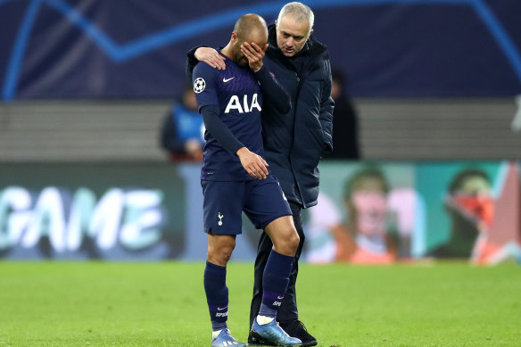 Lucas Moura is comforted by Jose Mourinho after Spurs' loss.
