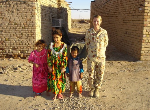 Sarah Watson with Iraqi children.