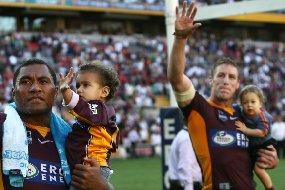 Petero Civoniceva and Brad Thorn wave to the crowd during a lap of honour after their last home game for the Brisbane Broncos in 2007.