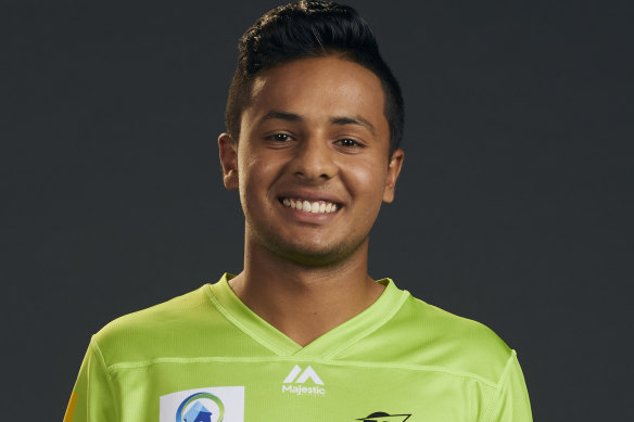 Tanveer Sangha starred with bat and ball in the Australians' win  over Afghanistan.