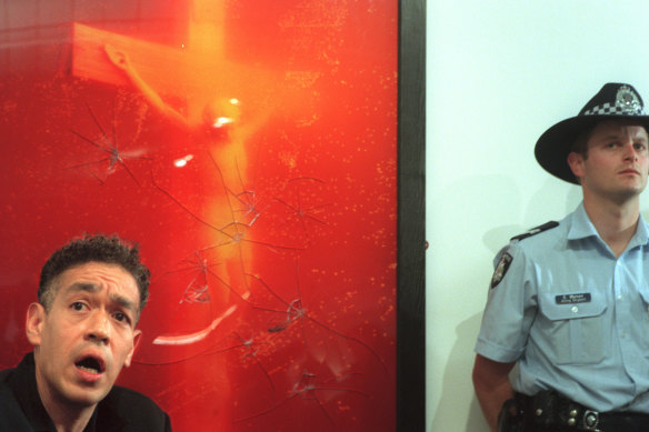 Artist Andres Serrano with his twice-vandalised work, Piss Christ.   