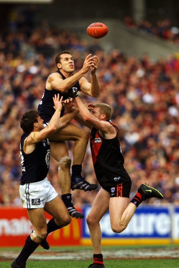 Anthony Koutoufides soars as the teams slugged it out for a grand final berth.