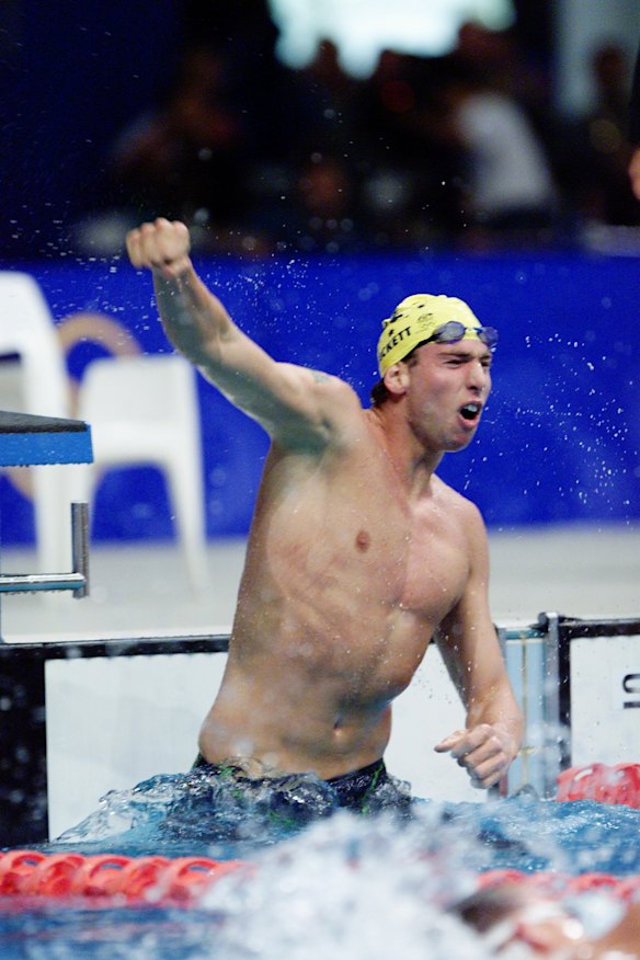 Grant Hackett celebrates his victory.