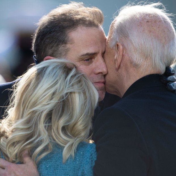Hunter Biden embraces his father, Joe, and Jill Biden during Joe’s presidential inauguration ceremony in Washington in January.