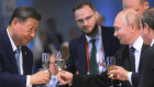 Chinese President Xi Jinping, left, Russian President Vladimir Putin, centre, and Egyptian President Abdel Fattah el-Sisi clink glasses during a festive reception to mark the BRICS Summit in Kazan, Russia.