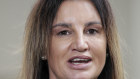 Tasmanian independent senator Jacqui Lambie might have the final say on big changes to fees for degrees.