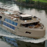 On the river in the cappuccino-coloured MS Estrela.