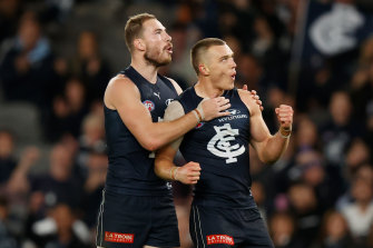 On song: Carlton's Harry McKay, left, and Patrick Cripps celebrate.