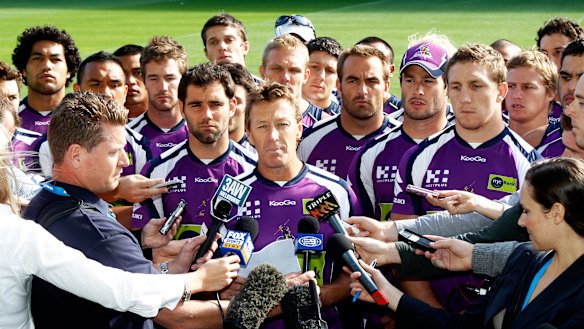 Craig Bellamy reads a statement in front of Melbourne players in April 2010.