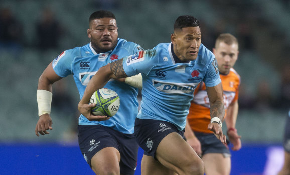 Staying put: Israel Folau on the fly against the Highlanders last Saturday.