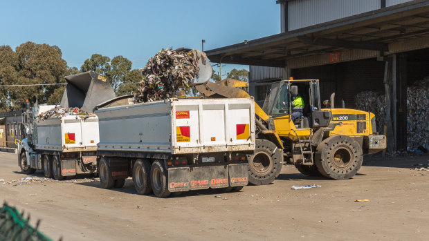 Recycling collected by councils and given to SKM is now being bulldozed into trucks and dumped at Ravenhall tip.