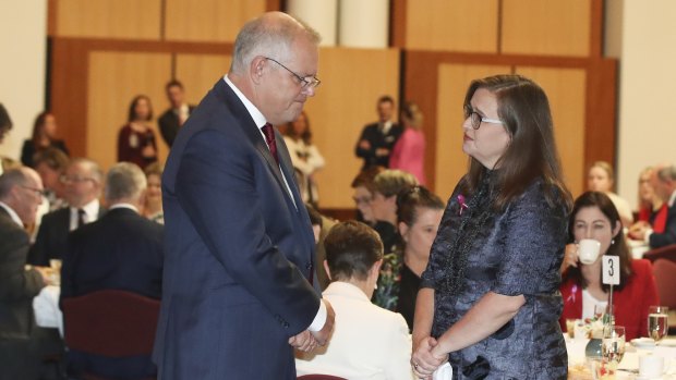 Prime Minister Scott Morrison speaks with Sex Discrimination Commissioner Kate Jenkins.