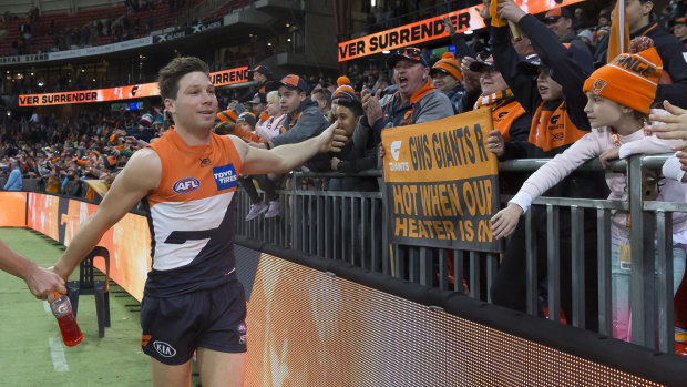 Follow me: Toby Greene soaks in the post-siren glory after leading the GWS Giants to a big win over Collingwood.