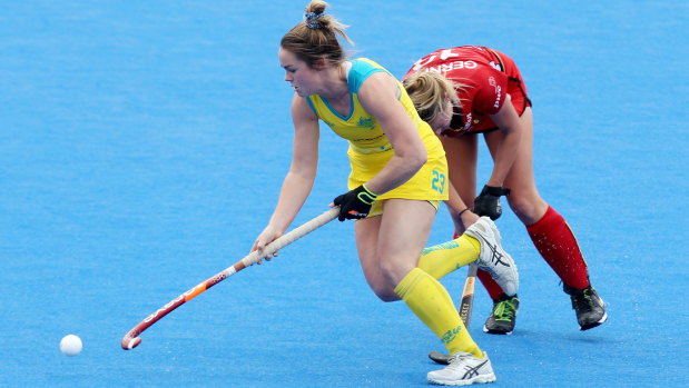 Stalemate: Australia's Kalindi Commerford and Belgium's Alix Gerniers tangle during their World Cup clash.