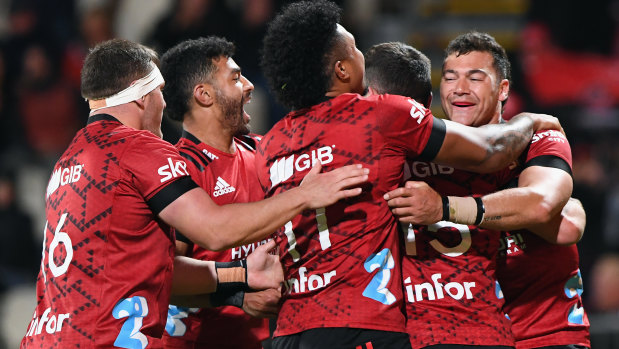 David Havili, right, and the Crusaders celebrate after Will Jordan scores against the Chiefs in round three of Super Rugby Aotearoa 2021.
