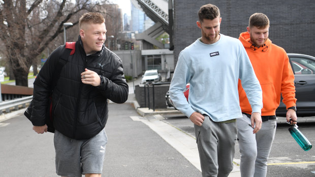 (L-R) Jordan De Goey, Jeremy Howe and Taylor Adams at Collingwood's Holden Centre on Saturday morning. 