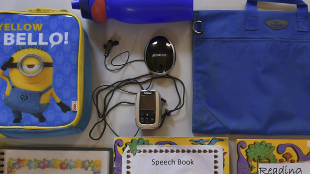 A roger device can be used to help deaf students communicate at school.