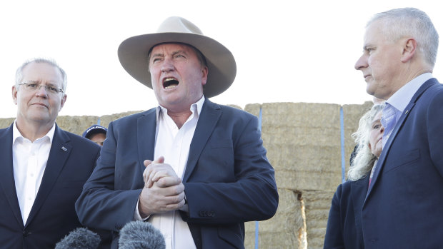 Drought envoy Barnaby Joyce, centre, with Prime Minister Scott Morrison (left),  and Deputy Prime Minister Michael McCormack during a visit this month to a property at Royalla to discuss the drought.