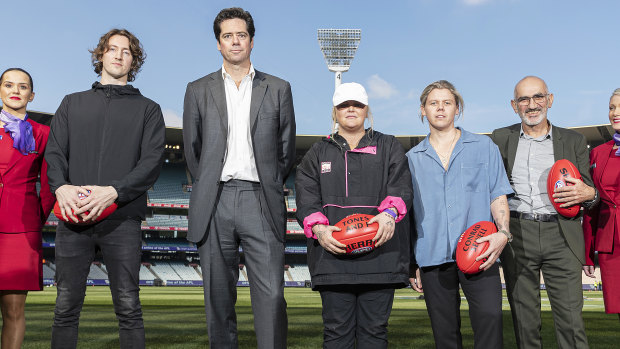 (L-R) Dean Lewis, Gillon McLachlan, Tones and I, Conrad Sewell and Paul Kelly pose for a photo during the 2019 AFL grand final entertainment launch. 