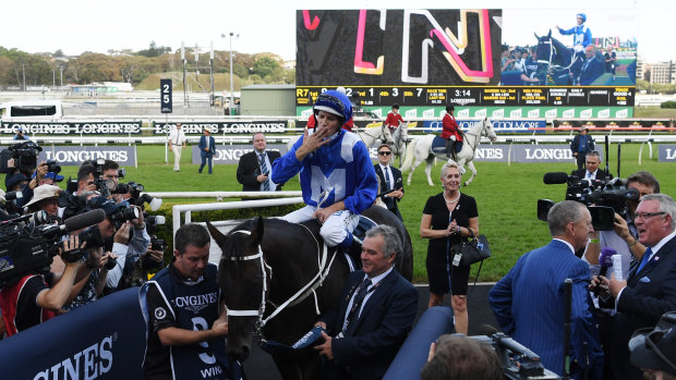 Wonderful: The crowd shows its appreciation for Winx at Randwick.