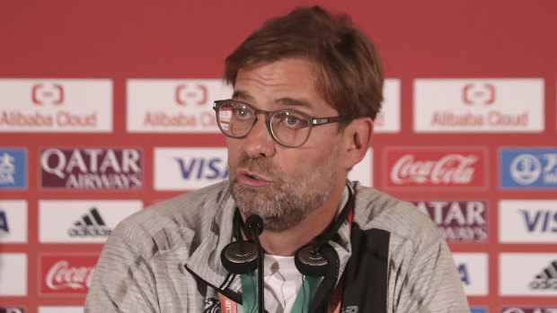 Liverpool manager Jurgen Klopp addresses the media in Doha, Qatar before his side's Club World Cup semi-final soccer match against Monterrey.