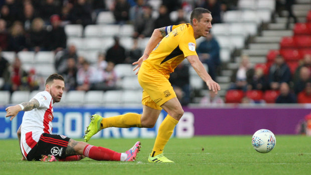 Mark Milligan skips away from Sunderland's Chris Maguire in a League One clash in November.