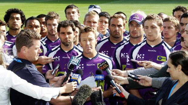 Craig Bellamy reads a statement in front of Melbourne players in April 2010.