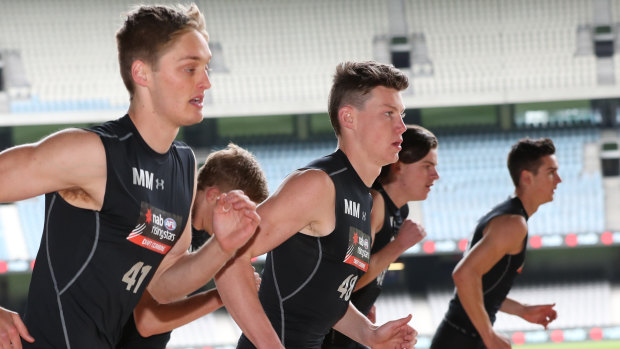 Sam Walsh from the Geelong Falcons (centre) during the AFL draft combine.
