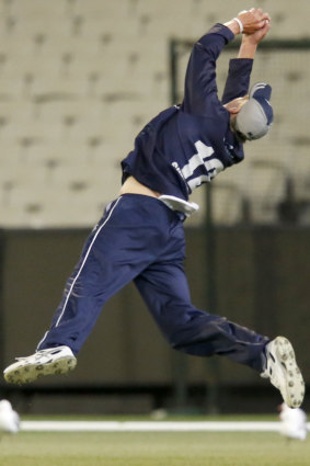 Screamer: Will Sutherland takes a diving catch for Victoria at the MCG.