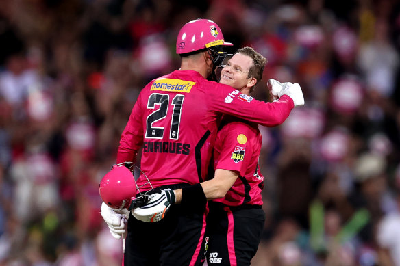 Steve Smith is congratulated by Moises Henriques after notching his century.