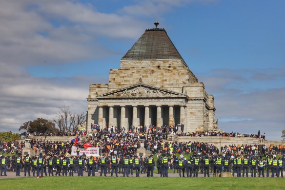 Police surrounded protesters at the Shrine.